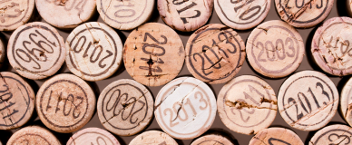 masthead stacking of wine cork background with vintage years v2