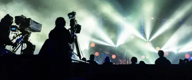 masthead silhouette of a group of cameramen broadcasting an event